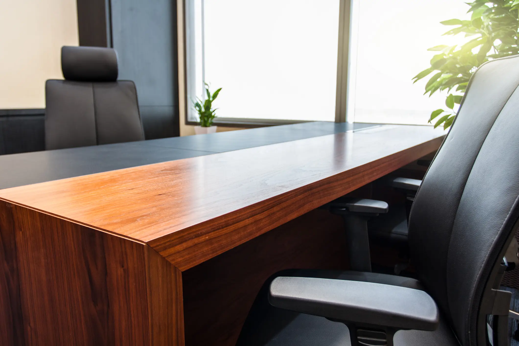 Executive office desk and chairs setup