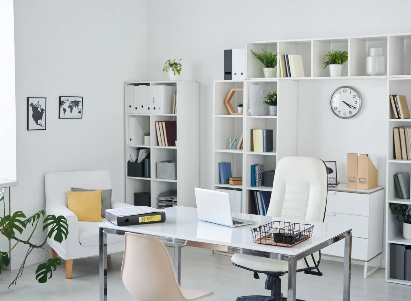 Minimalist workspace with shelves and desk